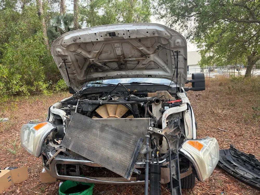 Mobile diesel truck repair: engine bay diagnostics on a work truck in Southwest Florida